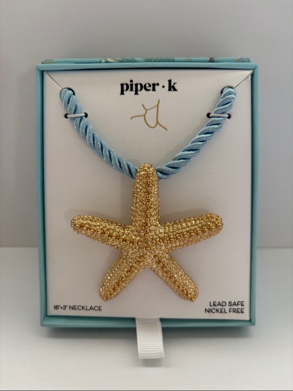 Piper-K Gold Starfish Pendant Necklace on Light Blue Cord